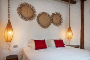Postel nebo postele na pokoji v ubytování Mawimbi Boutique Hotel