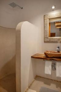 Koupelna v ubytování Mawimbi Boutique Hotel