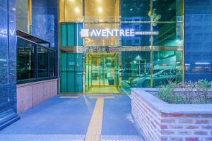 a entrance to a building with a sign on it at 호텔 아벤트리 여의도 in Seoul