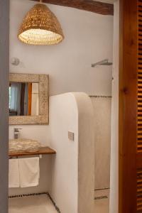 Kuchyň nebo kuchyňský kout v ubytování Mawimbi Boutique Hotel