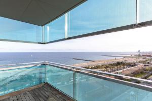 a view of the ocean from the top of a building at Luxury Apartment With Sea View! in Barcelona