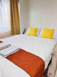 Postel nebo postele na pokoji v ubytování Home Escape
