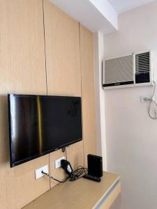 TV a/nebo společenská místnost v ubytování Home Escape