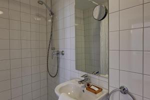Koupelna v ubytování Hotel Kleine Radlerherberge + 11 fotografií