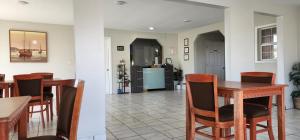 a kitchen and dining room with a table and chairs at Star Inn in Tonopah