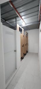 an empty room with doors and lockers in a building at 3S Farm and Resort in San Antonio
