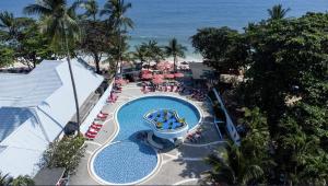 an overhead view of a swimming pool at a resort at MATCHA SAMUI RESORT formerly Chaba Samui Resort in Chaweng