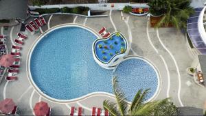 an overhead view of a pool at a resort at MATCHA SAMUI RESORT formerly Chaba Samui Resort in Chaweng