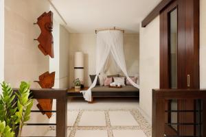 Ein Bett oder Betten in einem Zimmer der Unterkunft Villa Camellia by Nakula