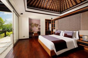 Ein Bett oder Betten in einem Zimmer der Unterkunft Villa Camellia by Nakula