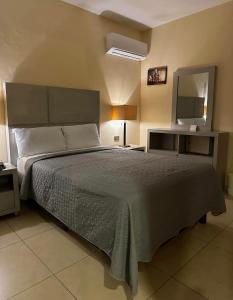Postel nebo postele na pokoji v ubytování Hotel Boutique Boca - Veracruz