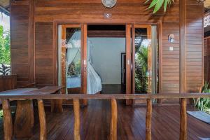 Balkón nebo terasa v ubytování D'Muncuk Huts Lembongan