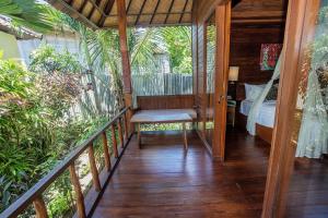 Balkón nebo terasa v ubytování D'Muncuk Huts Lembongan