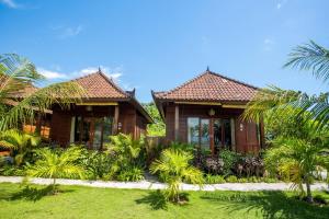 Zahrada ubytování D'Muncuk Huts Lembongan