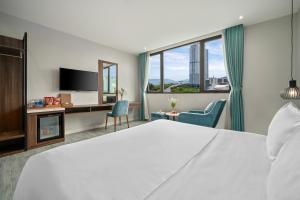 Postel nebo postele na pokoji v ubytování Lupin Boutique Hotel Danang
