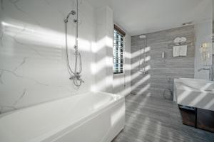 Koupelna v ubytování Lupin Boutique Hotel Danang