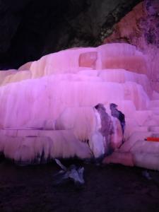 an ice cave with two birds sitting on it at Triệu Chương Homestay in Cao Bằng