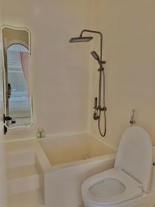 Ein Badezimmer in der Unterkunft Jeju Homestay