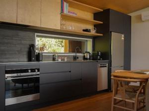 A kitchen or kitchenette at Rapaki Studio