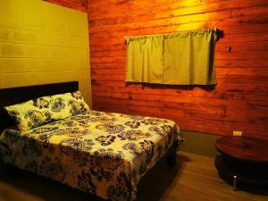 Giường trong phòng chung tại Cabaña Paraíso Jaular
