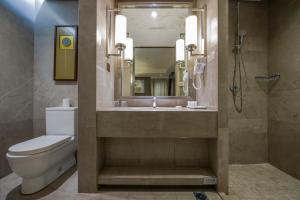 Vannituba majutusasutuses Merlinhood Hotel Guangzhou Xiajiao Metro Station Shaxi International Hotel Supplies City