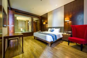 Voodi või voodid majutusasutuse Merlinhood Hotel Guangzhou Xiajiao Metro Station Shaxi International Hotel Supplies City toas