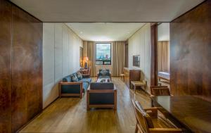 Istumisnurk majutusasutuses Merlinhood Hotel Guangzhou Xiajiao Metro Station Shaxi International Hotel Supplies City