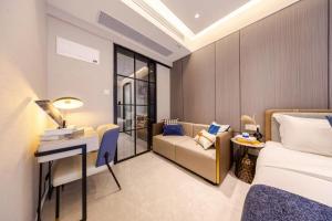 Area soggiorno di Excellence International Apartment - Convention & Exhibition Center