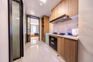 Cucina o angolo cottura di Excellence International Apartment - Convention & Exhibition Center