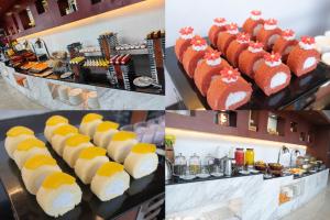 a bunch of desserts on display at a buffet at Huaqiang Plaza Hotel Shenzhen, Enjoy Complimentary Mini Bar & Night Snack, Add breakfast - enjoy complimentary afternoon tea in Shenzhen