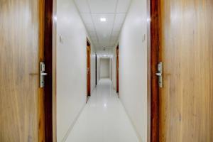 an empty corridor in a hospital hallway at OYO Hotel Address Inn in Mumbai
