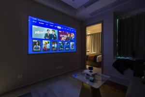 TV o dispositivi per l'intrattenimento presso Excellence International Apartment - Convention & Exhibition Center