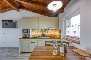 Kuchyň nebo kuchyňský kout v ubytování Tourist Farm Tonin - Apartment 3 - Happy Rentals