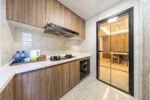 Cucina o angolo cottura di Excellence International Apartment - Convention & Exhibition Center