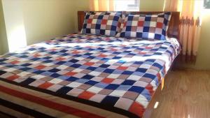 Ένα ή περισσότερα κρεβάτια σε δωμάτιο στο Trung Anh Sapa Hostel - by Bay Luxury