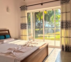 Postel nebo postele na pokoji v ubytování Ella Sobaway Resorts