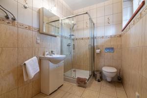 Kúpeľňa v ubytovaní Apartamenty pod Słońcem