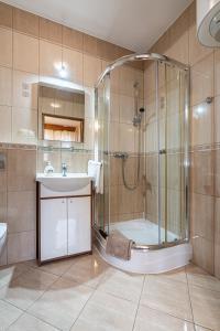 Kúpeľňa v ubytovaní Apartamenty pod Słońcem