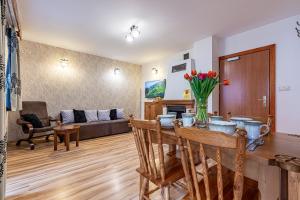 Posedenie v ubytovaní Apartamenty pod Słońcem