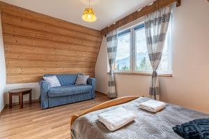 Posteľ alebo postele v izbe v ubytovaní Apartamenty pod Słońcem