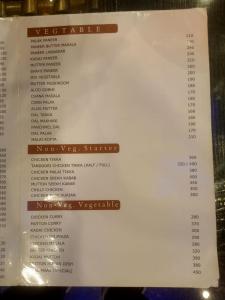 a picture of a menu for a restaurant at Hotel Shree Narayan Palace in Jaipur