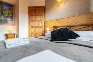 Posteľ alebo postele v izbe v ubytovaní Apartamenty pod Słońcem