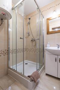 Kúpeľňa v ubytovaní Apartamenty pod Słońcem
