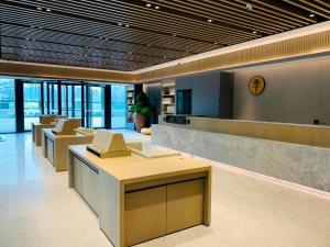 Majoituspaikan JI Hotel Hangzhou Qianjiang New City Civil Center aula tai vastaanotto