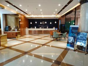 De lobby of receptie bij Starway Hotel Ha'Erbin Convention And Exhibition Center