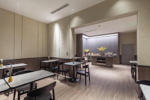 Restaurant ou autre lieu de restauration dans l'établissement Hanting Hotel Jinan Quanfu North Garden Street