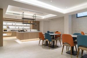 Hanting Hotel Jiaxing Technology City tesisinde mutfak veya mini mutfak