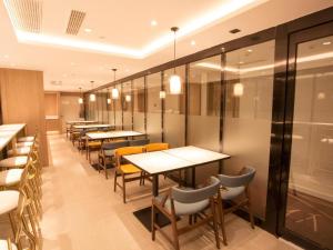 Restaurant o un lloc per menjar a Hanting Premium Hotel Beijing Huayuanqiao