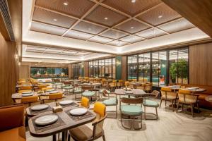 Restorāns vai citas vietas, kur ieturēt maltīti, naktsmītnē Orange Hotel Beijing Lize Commercial Zong Maliandao