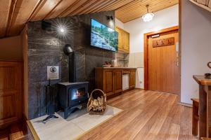 Kuchyňa alebo kuchynka v ubytovaní Apartamenty pod Słońcem